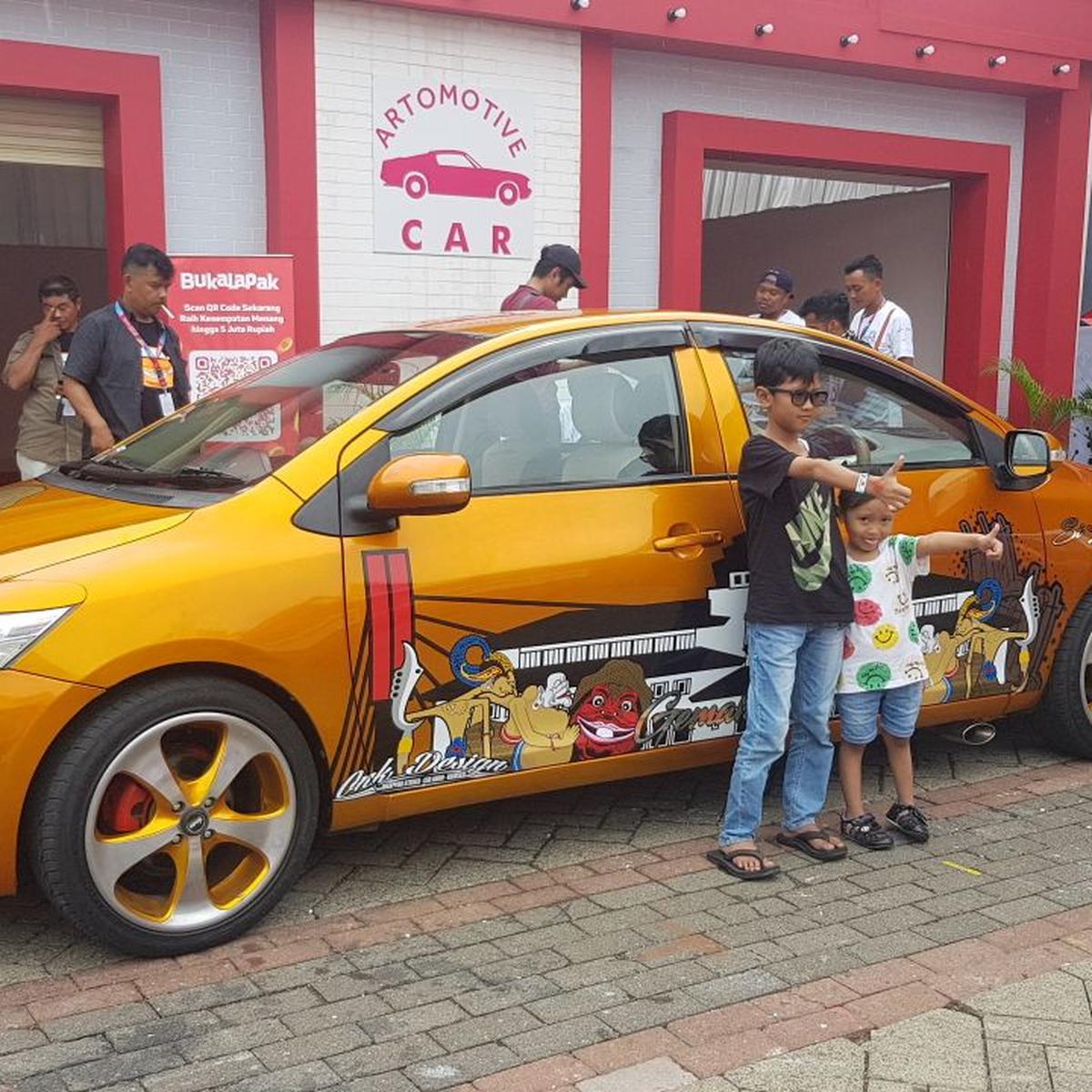 Mobil Muka Dua Ganggu Konsentrasi Penonton Band Gigi Otomotif Liputan6com