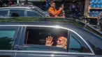 Perdana Menteri India Narendra Modi melambaikan tangan dari kendaraan saat tiba di Kompleks Candi Prambanan di Sleman, Yogyakarta, Rabu, 8 Juli 2026. (AFP/ Devi Rahman)