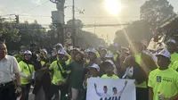 Massa pendukung Anies-Cak Imin sudah memadati kompleks Komisi Pemilihan Umum (KPU) di Jalan Imam Bonjol Jakarta Pusat. (Liputan6.com/Radityo Priyasmoro)