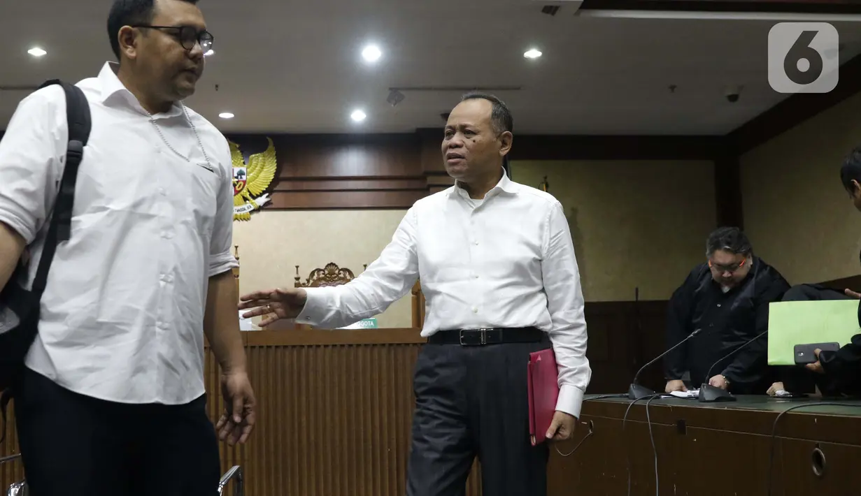 Terdakwa kasus dugaan kepemilikan senjata api illegal, Habil Marati usai menjalani sidang lanjutan di Pengadilan Negeri Jakarta Pusat, Kamis (3/10/2019). Sidang beragendakan pembacaan eksepsi yang dibacakan terdakwa dan penasehat hokum terdakwa. (Liputan6.com/Helmi Fithriansyah)