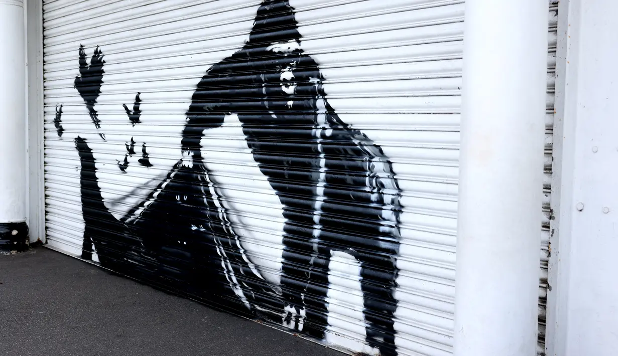 Lukisan ini dapat menjelaskan mengapa makhluk-makhluk ciptaan Banksy muncul di tempat-tempat yang tidak biasa di London selama sembilan hari berturut-turut. (Adrian DENNIS / AFP)