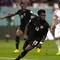 Pemain Timnas Kanada, Alphonso Davies melakukan selebrasi usai mencetak gol ke gawang Timnas Kroasia dalam laga matchday kedua Grup F Piala Dunia 2022 di Khalifa International Stadium, Doha, Qatar, Minggu (27/11/2022) malam WIB. (AP/Thanassis Stavrakis)