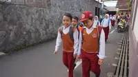 Program Walk to School yang berjalan di Kota Bandung dinilai tak hanya bisa mengurangi kemacetan, tetapi juga bisa mendatangkan kegembiraan. (Liputan6.com/Huyogo Simbolon)