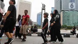 Pemerintah Provinsi DKI Jakarta tetap menggelar Hari Bebas Kendaraan Bermotor (HBKB) atau Car Free Day terakhir di tahun 2024 pada Minggu (29/12/2024). (Liputan6.com/Herman Zakharia)