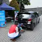 Pertamina Patra Niaga melalui Regional Jawa Bagian Barat (JBB) bekerjasama dengan pemda DKI Jakarta mengadakan uji emisi kendaraan mobil gratis bagi konsumen Pertamax Series. Foto: Pertamina