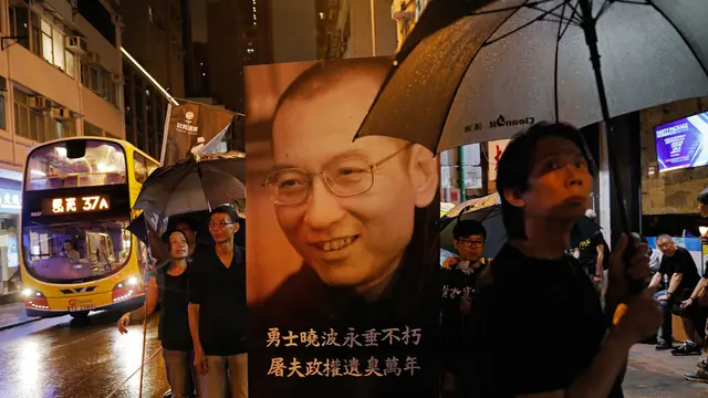 Kenang Liu Xiaobo, Ribuan Warga Hong Kong Turun ke Jalan