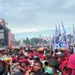 Capres-cawapres nomor urut tiga Ganjar Pranowo dan Mahfud Md menggelar acara Hajatan Rakyat di Banyuwangi, Jawa Timur. (Liputan6.com/Nanda Perdana Putra)