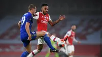 Aksi pemain Arsenal, Pierre-Emerick Aubameyang, pada laga melawan Leicester City di Stadion Emirates, Rabu (8/7/2020) dini hari WIB. (Michael Regan/AFP)