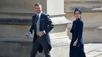 David Beckham dan Victoria Beckham tiba untuk upacara pernikahan Pangeran Harry dan Meghan Markle di St. George's Chapel, Windsor Castle, Windsor, dekat London, Inggris, Sabtu (19/5). (Gareth Fuller/pool photo via AP)