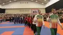 Parade atlet saat Pembukaan Kejuaraan Dunia Karate Junior, Cadet dan U-21 di Indonesia Convetion Exhibition (ICE), Bumi Serpong Damai, Tangerang, Kamis (12/11/2015). (Bola.com/Vitalis Yogi Trisna)