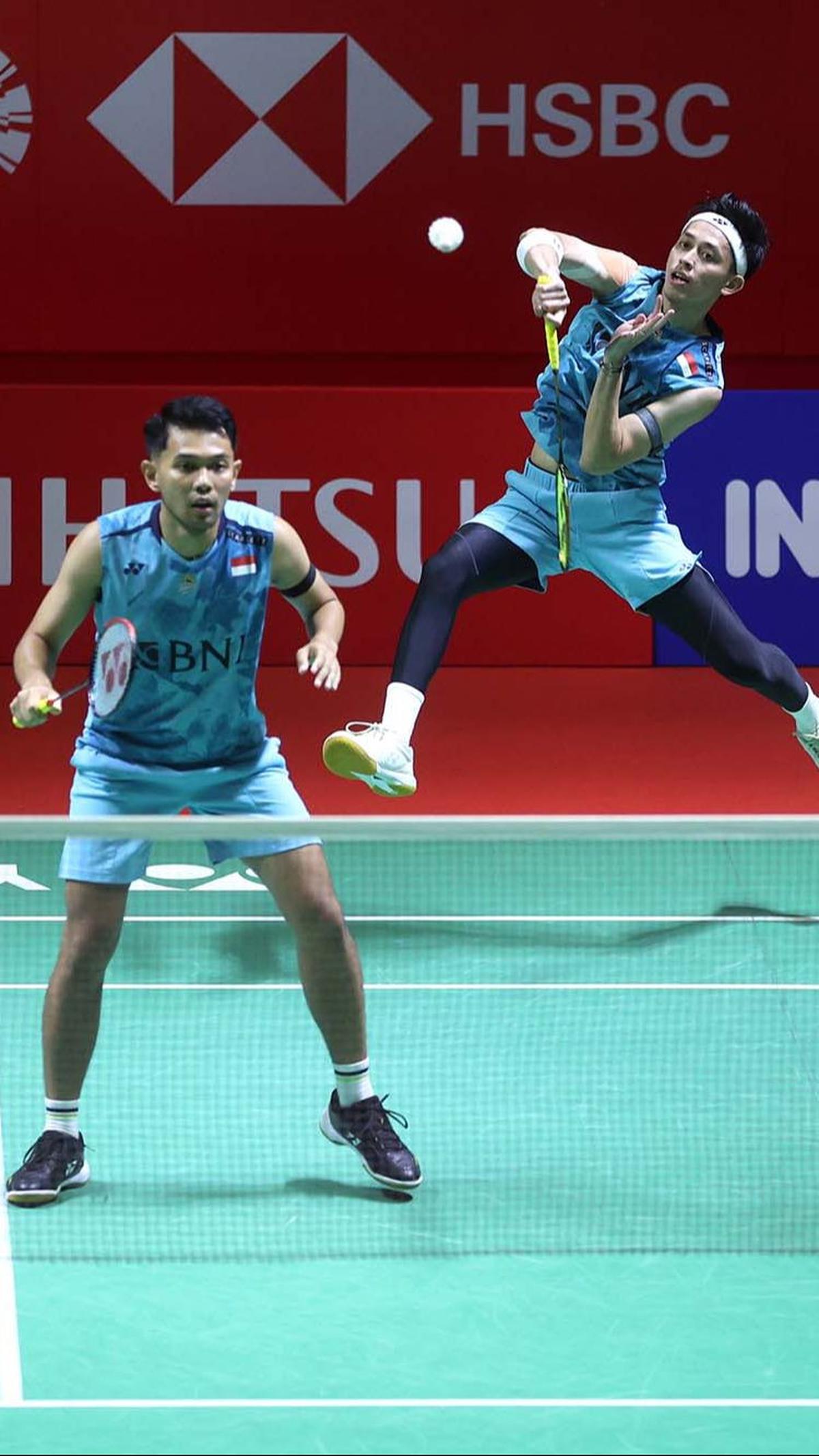 Fajar/Rian berhasil mengatasi&nbsp;Man/Tee lewat straight game dengan skor&nbsp;21-18, 22-20.&nbsp;Foto: Bola.com/M. Iqbal Ichsan