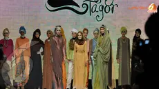 Risti Tagor pun tampak tersenyum lega karena kali ini ia bisa memeragakan berbagai rancangan busana muslim karyanya (Liputan6.com/ Panji Diksana)