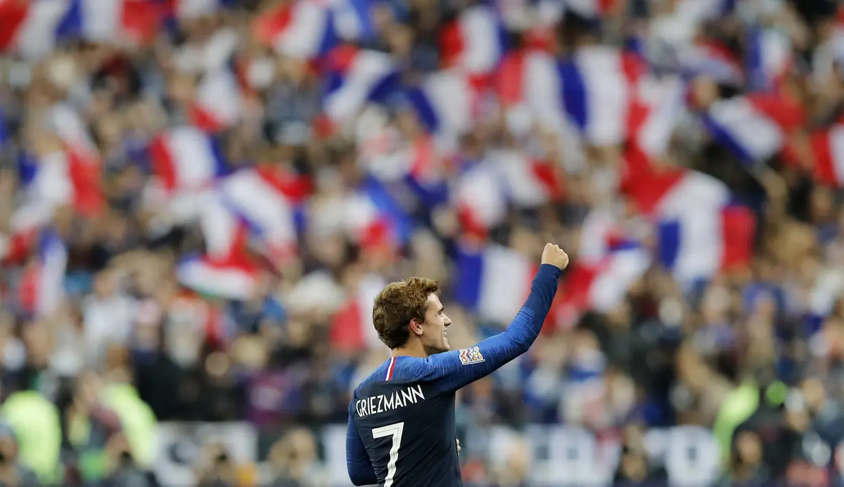 Penyerang Prancis, Antoine Griezmann, melakukan selebrasi usai membobol gawang Jerman pada laga UEFA Nations League di Stade de France, Paris, Selasa (16/10/2018). Prancis menang 2-1 atas Jerman. (AP/Christophe Ena)