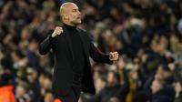 Selebrasi pelatih Manchester City, Pep Guardiola setelah Kevin De Bruyne mencetak gol penyeimbang 1-1 ke gawang Real Madrid pada laga leg kedua perempatfinal Liga Champions 2023/2024 di Etihad Stadium, Manchester, Rabu (18/4/2024). (AP Photo/Dave Thompson)