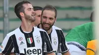 Juventus meraih kemenangan ti[is 2-1 melawan Chievo Verona, Minggu (6/11/2016). (AFP)