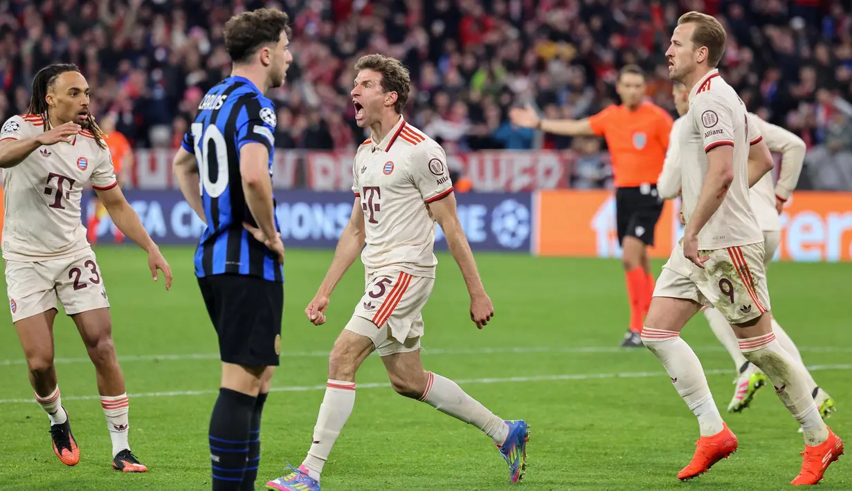 Pada menit ke-85, Thomas Muller berhasil mencetak gol penyeimbang. (Alexandra BEIER/AFP)