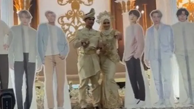 Pernikahan Ena Izzati Jamri yang membawa figur tujuh orang personel BTS naik pelaminan