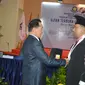 Blucer Welling Rajagukguk dalam ujian terbuka yang digelar Program Pascasarjana Doktor Ilmu Hukum Universitas Kristen Indonesia (UKI), Kamis (5/10) (Istimewa)