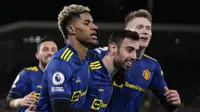 Manchester United kembali ke jalur kemenangan usai menang 3-1 atas tuan rumah Brentford, Rabu (19/1/2022) dalam lanjutan Liga Inggris 2021/2022. Bruno Fernandes menjadi bintang dan tampil tidak egois dengan dua assistnya kepada Mason Greenwood dan Marcus Rashford. (AP/Matt Dunham)