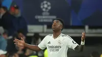 Real Madrid semakin tak terbendung usai dua gol Vinicius Junior, menit ke-55 dan 77, merobek jala gawang RB Salzburg. (Pierre-Philippe MARCOU/AFP)