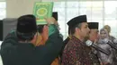 Rohaniawan mengambil sumpah saat pelantikan pejabat baru di Gedung KPK, Jakarta, Kamis (20/9). Salah satunya adalah pejabat Direktur Penyidikan KPK, Kombes Panca Putra Simanjutak yang menggantikan Brigjen Aris Budiman. (Merdeka.com/Dwi Narwoko)