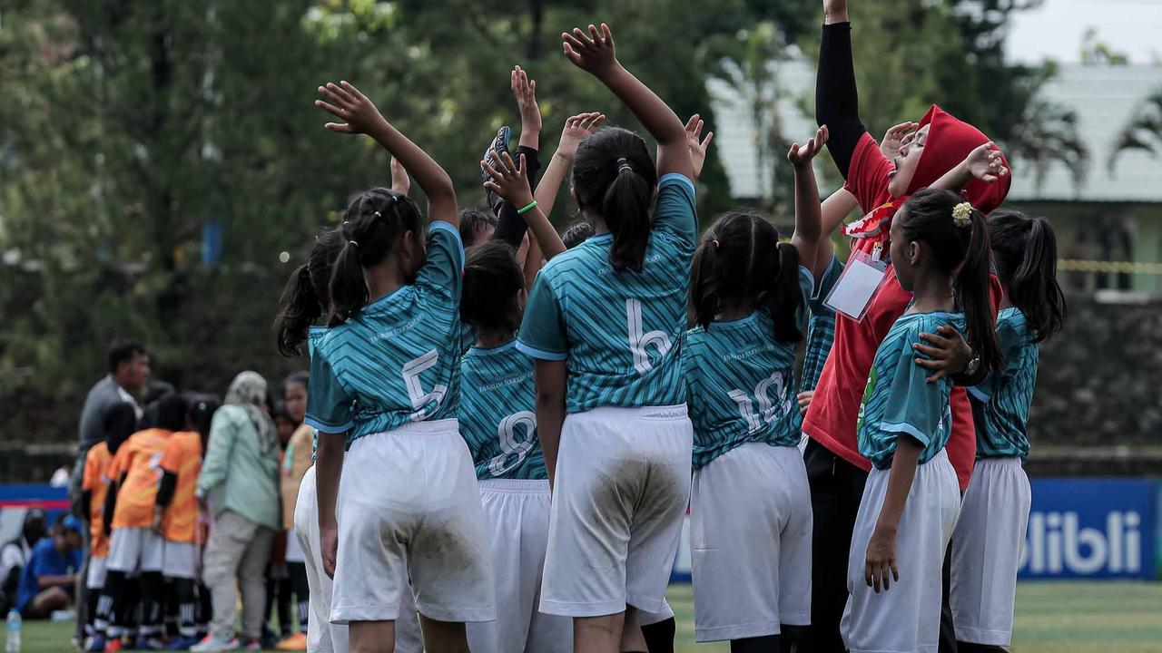 FOTO: Keseruan Murid SD Bermain Bola saat MilkLife Soccer Challenge-Jakarta 2025