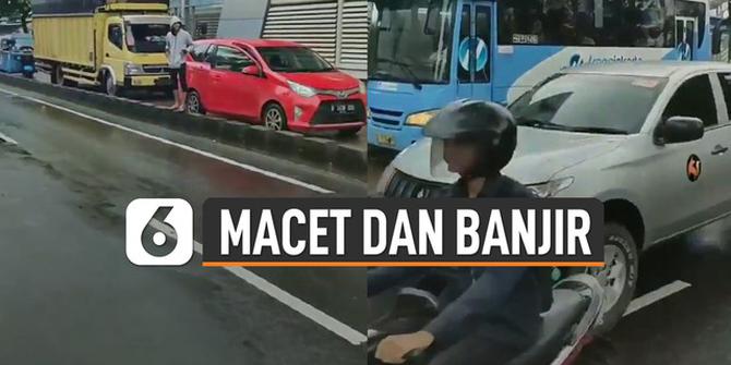 VIDEO: Akibat Macet dan Banjir, Kendaraan Umum Masuk Jalur TransJakarta