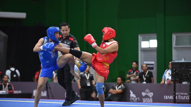 Suasana pertandingan wushu pada PON Bela Diri Kudus 2025