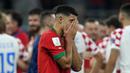 Kekecewaan serupa pun ditunjukkan oleh Anass Zaroury, sayap kiri Maroko yang menjalani debut di Piala Dunia justru di akhir perjalanan Maroko pada laga perebutan tempat ketiga. (AP Photo/Francisco Seco)