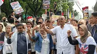 Aliansi Masyarakat Jakarta menggelar unjuk rasa di kawasan Patung Kuda, Jakarta Pusat, Senin (22/6/2026) (Liputan6.com/Winda Nelfira)