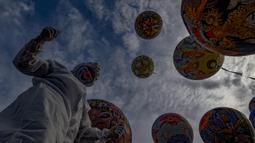Festival yang menampilkan keindahan balon udara berwarna-warni ini merupakan bagian dari tradisi masyarakat Wonosobo yang telah berlangsung sejak puluhan tahun silam. (merdeka.com/Arie Basuki)
