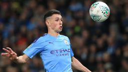 Phil Foden (19 tahun) - Phil Foden ikut menyumbang satu gol saat Manchester City mengalahkan Dinamo Zagreb pada laga matchday kedua fase grup Liga Champions 2019/20 di Etihad Stadium. Pemain asal Inggris ini kerap disebut sebagai sosok yang pantas menjadi penerus David Silva. (AFP/Lindsey Parnaby