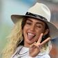 "Saat Miley menghapus semua foto di Instagram, ia tahu orang-orang akan bertanya alasannya," ujar seorang sumber. (JEWEL SAMAD  AFP)