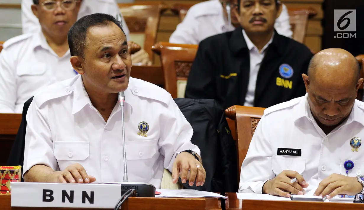 Kepala BNN Irjen Pol Heru Winarko saat Rapat Dengar Pendapat (RDP) dengan Komisi III DPR di Jakarta, Kamis (7/6). Rapat membahas Rencana Kerja dan Anggaran Kementerian dan Lembaga (RKAKL) dan Rencana Kerja Pemerintah (RKP) 2019. (Liputan6.com/JohanTallo)
