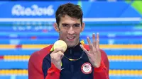 Ekspresi perenang AS, Michael Phelps, seusai memenangi nomor 200 meter gaya ganti perseorangan di Olimpiade Rio 2016, Jumat (12/8/2016) pagi WIB. (EPA/Dean Lewis)