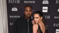 Kim Kardashian dan Kanye West. (AFP/Bryan Bedder/GETTY IMAGES NORTH AMERICA)