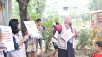 Komunitas Sobat Sehat menggelar program kemanusiaan di Kelurahan Pejaten Timur, Jakarta Selatan, Sabtu (14/10). Program tersebut mengambil tajuk "Gotong Royong Cegah Stunting" dan berfokus pada pencegahan stunting melalui langkah konkret membagikan 1 Ton ikan laut kepada keluarga yang membutuhkan (Istimewa)