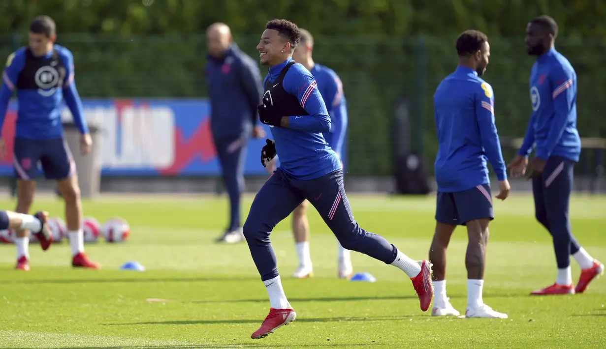 Gelandang timnas Inggris Jesse Lingardmenghadiri sesi latihan di Hotspur Way Training Ground, London, Senin (11/10/2021). Inggris akan meladeni Hungaria dalam lanjutan Kualifikasi Piala Dunia 2022 zona Eropa Grup I pada Rabu, 13 Oktober 2021. (John Walton/PA via AP)