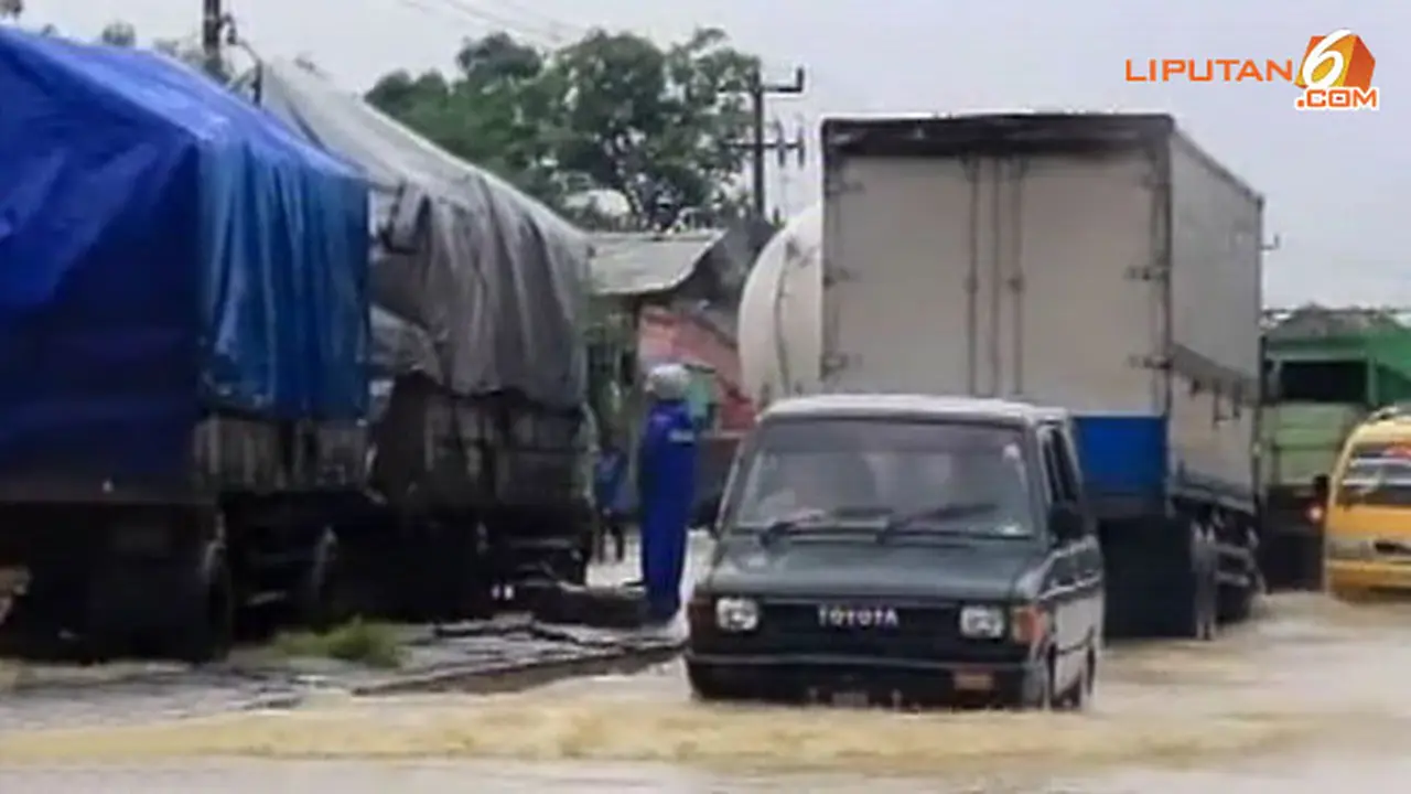banjir-pantura--140120-a.jpg