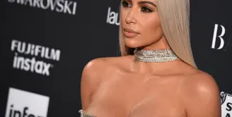 Travis Scott dikabaran tak memberikan dukungan untuk Kylie Jenner di masa-masa kehamilannya. Hal tersebut membuat Kim Kardashian marah. (ANGELA WEISS / AFP)