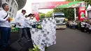 Menteri Badan Usaha Milik Negara (BUMN) Rini Soemarno saat melepas sebanyak 26.018 pemudik gratis dalam Program Mudik Bareng BUMN 2019 di Gelora Bung Karno (GBK), Senayan, Jakarta, Kamis (30/5/2019). (Liputan6.com/HO/Iqbal)