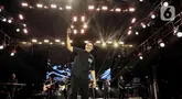 Penyanyi sekaligus penulis lagu, Tulus saat tampil memeriahkan KapanLagi Buka Bareng BRI Festival 2025 di Plaza Parkir Timur Gelora Bung Karno, Senayan, Jakarta, Sabtu (15/3/2025). (Liputan6.com/Angga Yuniar)