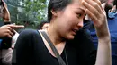 Made Sandy Salihin, saudara kembar dari Mirna saat tiba di Gedung Direktorat Reserse Kriminal Umum Polda Metro Jaya, Rabu (3/2/2016). Polisi memanggil Sandy untuk dimintai keterangan sebagai saksi. (Liputan6.com/Faisal R Syam)