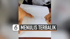Viral di media sosial, salah seorang murid SMK mempunyai kebiasaan unik. Jika pada umumnya orang menulis pada posisi normal, justru siswa ini menulis dengan posisi terbalik dan menggunakan tangan kiri.