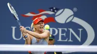 Maria Sharapova saat mengikuti AS Terbuka 2014. Sharapova dijadwalkan menghadapi Simona Halep pada turnamen tahun ini. (AP Photo/Jason DeCrow)