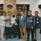 Partai NasDem memberikan surat rekomendasi kepada Ahmad Riza Patria dan Marshel Widianto untuk Pemilihan Wali Kota Tangerang Selatan atau Pilwakot Tangsel. (Merdeka).