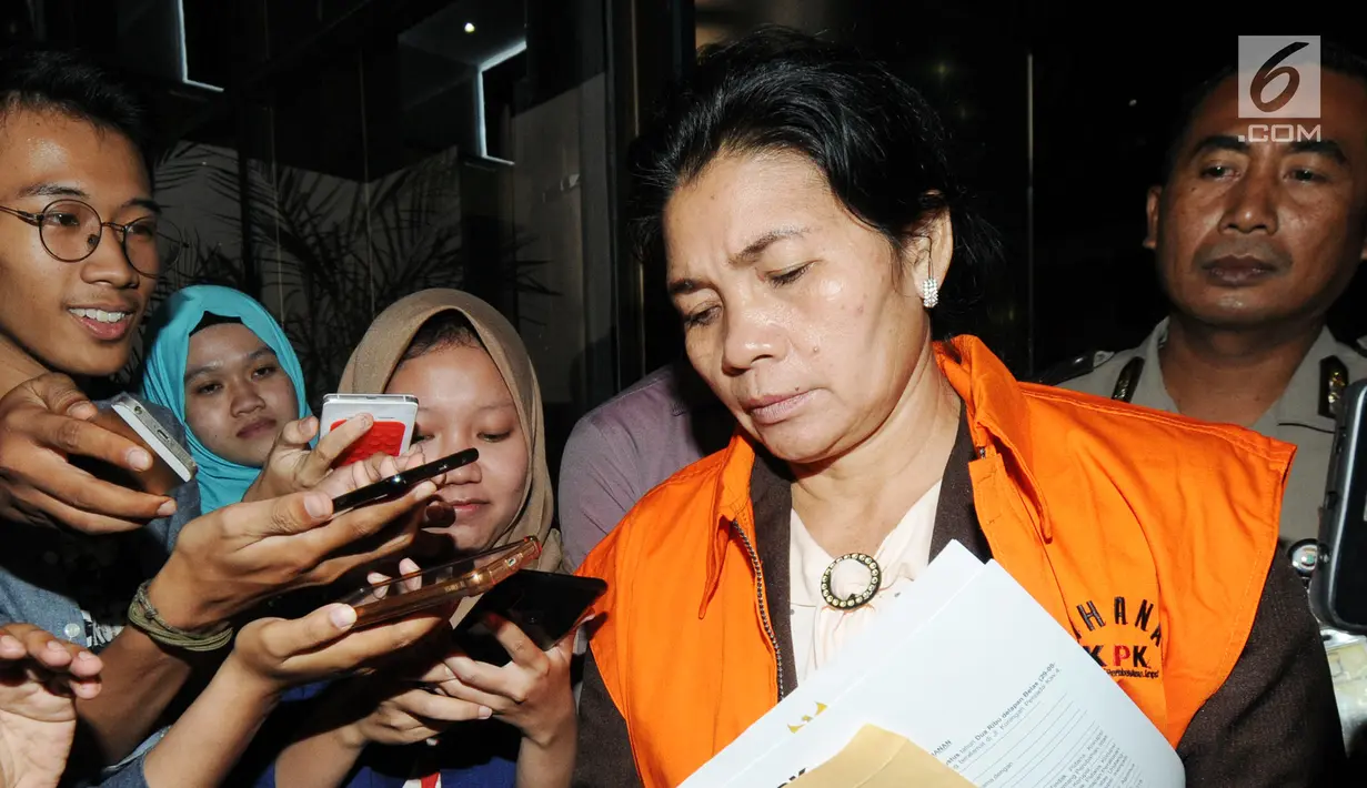Merry Purba resmi ditetapkan tersangka dan ditahan KPK terkait suap putusan penanganan perkara dipengadilan Tipikor Medan.(merdeka.com/Dwi Narwoko)