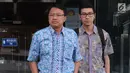 Dirut PT PJB, Iwan Agung Firstantara berjalan keluar usai menjalani pemeriksaan oleh penyidik di gedung KPK, Jakarta, Jumat (12/10). Iwan Agung Firstantara diperiksa terkait suap dalam proyek PLTU Riau-1. (Merdeka.com/Dwi Narwoko)
