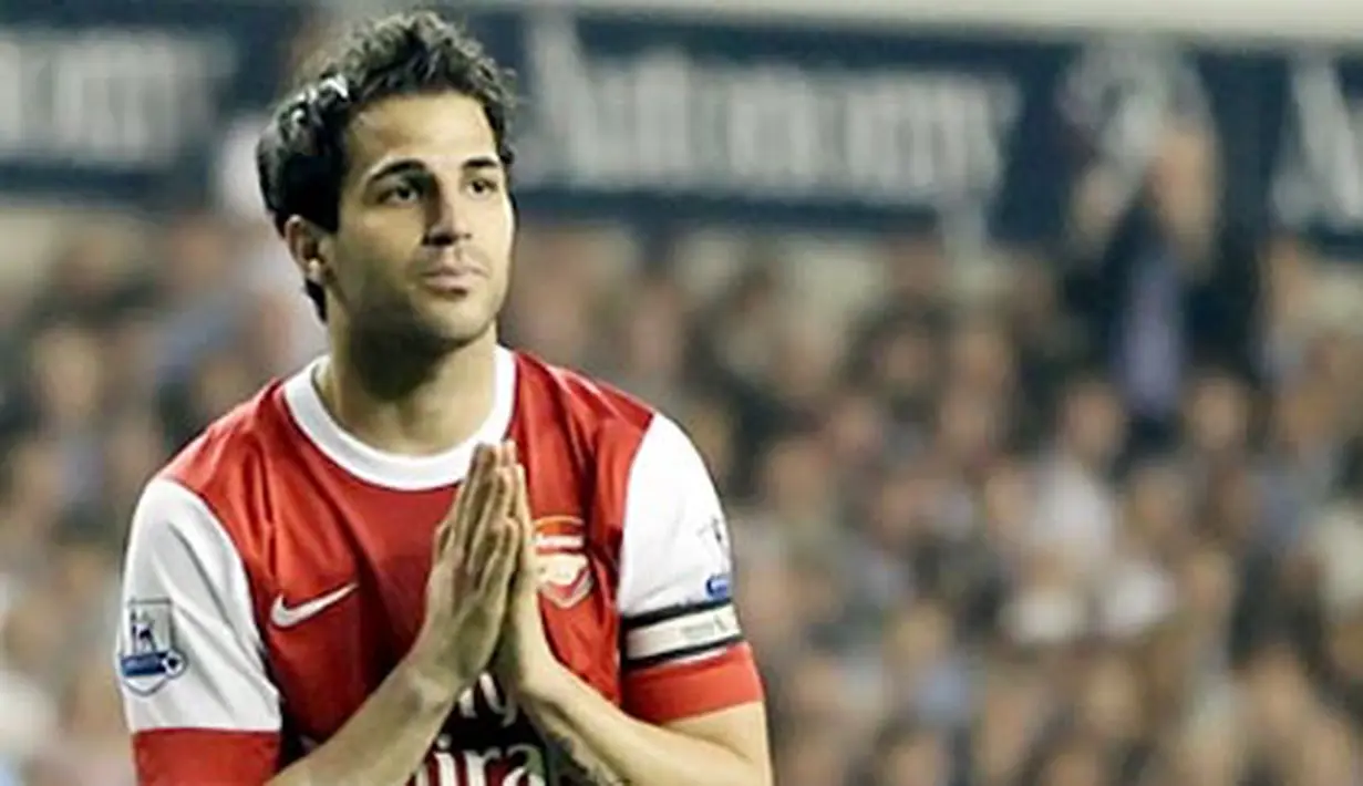 Reaksi dari gelandang dan kapten Arsenal Cesc Fabregas pada partai Liga Premier melawan Tottenham Hotspur di White Hart Lane, 20 April 2011. AFP PHOTO/ADRIAN DENNIS