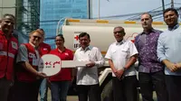 PMI Terima Bantuan 10 Truk Air dan 1 Truk Barang dari IFRC